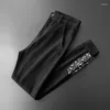Calças de brim masculinas qualidade impressa solta alta 2023 primavera e verão high-end marca macacão coreano moda juventude calças casuais