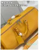 Último top original de bagagem única açafrão de três cores Bolsa de luxo de luxo Hold Saco de couro e capacidade de couro genuíno