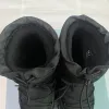 Après-Ski-Stiefel aus Nylon-Gabardine, Schwarz 1U007N, Obermaterial mit Kordelzug, herausnehmbares, gepolstertes Florfutter, emaillierte Triangel-Stiefel aus Metall, Designer-Skistiefel mit Gummisohle3