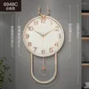 壁の時計装飾時計家の手のエレガントなギフトクォーツラグジュアリーリビングルームクラシックナンバーゴールドラウンドワンドク装飾