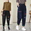 Jeans da donna Pantaloni stile harem patchwork a contrasto di colore casual allentati letterari autunnali Pantaloni alla moda versatili a vita alta elastici