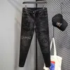 Mäns jeansdesigner Spring och Autumn New Fashion Märke för män Tung industrin Hot diamanttryck elastisk passform mångsidig svarta byxor 9tkj