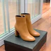 Classiques bottes pour femmes à la mode et exquises talons hauts et cuir véritable mode extérieure bottes courtes à talons hauts avec boîte