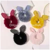 Accessoires pour cheveux Hiver Fourrure douce Oreilles de lapin Scrunchie Bows Porte-queue de cheval Bandeau Bow Noeud Scrunchy Filles Cravates Drop Livraison Prod Dhjcb