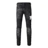 2023 Designer Mens Jeans Purple High Street Casual Print Jeans Byxor Oversize Ripped Patch Hole Denim Straight Streetwear Slim