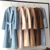 Women's Wool Blends Special erbjudande Cashmere Coat Kvinna Vinter Midlängd Korrugerad svart kvinna Autumn Casual Fashion Beige 231027