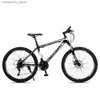 Bicicletas 24 26 pulgadas Bicicleta 21 24 27 Velocidad Pedal Pedal Radios de vehículo Freno de disco doble Amortiguación de acero de alto carbono Integrado Q231030