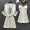 Jupe de lit pyjama femme printemps Sexy Camisole femme Robe ensemble glace soie à manches longues 2 pièces creux mode vêtements de nuit