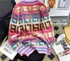 Kvinnors tröjor Designer hög kvalitet och super vacker tröja jacka för kvinnor i början av våren 2024, New Rainbow Letter Design Sense,
