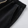 Jeans masculinos cordão mens casual solto 2023 coreano outono inverno calças esportivas com bolso versão clássica elástica