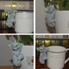 Objets décoratifs Figurines 1PC résine dinosaures suspendus tasse modèle Dragon accessoires résistant aux intempéries décoration de pot de fleur pour le bureau à domicile 231030