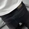 Jeans pour hommes Designer tendance coupe ample jean droit, lavé avec fermeture à glissière, pantalon d'hiver simple, petite jambe, taille moyenne, nouvelle tendance jeune 8YVJ