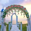 Vases roses vignes fleurs artificielles avec feuilles vertes tentures mur de fleurs pour salle de mariage