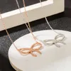 Tiffanylise Nuova collana coreana della famiglia T femminile S925 in argento sterling con ghiaccio con pendente pieno di diamanti alla moda Catena clavicola 9k9b