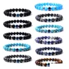 Charmarmband Turkish Blue Evil Eye 8mm Tiger Beads Handgjorda elasticitetsarmband för män Kvinnor Yoga Reiki smycken Drop Deli Dhgarden Dh68K