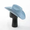 Szerokie brzegi czapki wiadra 100 wełniana zachodnia kowbojowa kapelusz kobiety mężczyźni jesienne zimowe swobodne filc kowgirl na zewnątrz osłona słońca ciepły wklęsły kształt fedoras top 231027