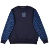 デザイナーのセーターの男性温かいセーターレタープリントユニセックスカシミアシールソフトスキンに優しいフード付きベースシャツカラーコントラストジャックメンズカジュアルセーター