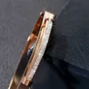 豪華な芸術家クラシックドライバーブレスレットファッションホット販売クリエイティブダイヤモンドインレイドパラレルバーは、オリジナルボックスでステンレス鋼工場で作られたローズゴールド