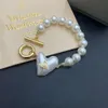 Designer Vivian Viviene High Version Empress Dowager Saturn Love Pearl Bracelet Women's Light Luxury Versatile Vivian Same Size Peach Heart Bracelet