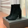 Classiques bottes pour femmes à la mode et exquises talons hauts et cuir véritable mode extérieure bottes courtes à talons hauts avec boîte