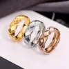 Klassieke Designer ring Gouden ring Heren Luxe Ringen Dames Titanium Staal Gegraveerd Monogram Patroon Trouwring Huwelijksgeschenken Verjaardagscadeaus