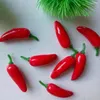 Dekorativa blommor konstgjorda paprika grönsaker po props skums röda falska chili prydnader mini dekor