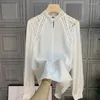 Blusas femininas moda mulher blusa 2023 outono francês cor sólida solta oco para fora renda emenda superior gola de pé