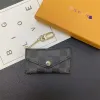 Mycket bra ny lyxdesigner Keychain Fashion Womens mini plånbok högkvalitativ äkta läder män myntväska färg plånböcker innehavare v