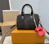 Hot designer duffle saco homens mulheres moda saco de viagem grande capacidade bolsa clássico impresso lona revestida de couro saco de viagem bolsa de embarque1