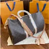 Bolsas de viagem de designer popular PU Bolsas de viagem de moda masculina e feminina Tote de grande capacidade Bolsa de viagem de couro de lona revestida clássica impressa Bolsa de embarque Bolsa tote