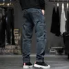 Jeans da uomo larghi da uomo taglie forti 40 44 pantaloni denim tasche moda cargo streetwear pantaloni larghi uomo fondo grande 231027