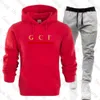 Survêtements de créateurs Hommes Femmes 2 pièces Tenues Mode Sweatsuit Casual Pull à manches longues Pull à capuche noir Top et Jo292S