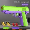 USP CHILDRES CARROT SOFT BULLET GUN1911自動リロードドラムマニュアルバースト排出シェルモデルガンおもちゃの子供の誕生日プレゼント