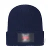 새로운 럭셔리 비니 디자이너 겨울 비니 남녀 패션 레터 디자인 니트 모자 가을 모직 모자 기하학적 유니스세 섹스 따뜻한 두개골 모자 A2