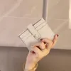 Piękny oryginalny skórzany uchwyt na karty kredytowe Designer Pierwsza klasa prawdziwa skórzana mini portfel Doskonała jakość mężczyzn Kobiet Kolor Holder Tourse z pudełkiem