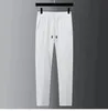 Men's Tracksuits Spring Summer Fashion Suit Men Long Sleeve Casual Shirts And Pant Seersucker Striped Pleats Slim Handsome Twopiece Set 231030