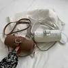 Axelväskor Cylindrical Bag Kvinnor Voice Bag Luxury Pu Cross Body Bag Designer Wallet Women's ClubStylishhandbagsstore