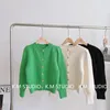 Chandails pour femmes 2023 automne et hiver femmes style rétro bulle épaule couleur unie pull court tricot cardigan manteau