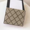 Famoso designer cereja bolsa de luxo mulheres mini cartão clipe marca italiana moda dobrável carteira nova alta qualidade titular do cartão de crédito genuíno couro moeda bolsas saco