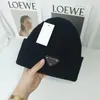 Winter gebreide designer beanie luxe baseball hoeden outdoor vrouw letter driehoek wollen motorkap man hoofd warm kasjmier schedel caps casual trucker groothandel