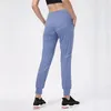 Kobiety nagi tkanina luźna fit sportowy aktywny salon jogger elastyczne legginsy z dwoma bocznymi kieszeniami pełna długość spodni jogayoga spodni jogger spodni
