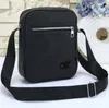 Vertical boys shoulder bag pu leather zipper pocket change bag black printed men's bag diagonal backpack #1603