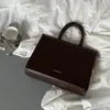Äkta läderdesignväskor handväska crossbody bokstäver axel sadel väskor med dammväska