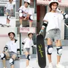 Skate Protective Gear 6pcs / Set Adult / Kids Gnee Pads Pads Elbow Plew Guards 6 en 1 Protective Gear Set pour rouleau Skate Skateboard Scooter Cycling Q231031