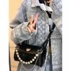 Axelväskor Girls 'Earth Lock Bag Fashion Women's Soul Bag Women's Cylinder Messenger Bag Wallet Bagstylishhandbagsstore