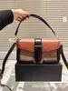 Bolsos de marca para mujer Bolso de mano negro Bolsos estilo cubo de cuero genuino Hebilla dorada o plateada Correa gruesa Viajes Oficina Compras Fin de semana viejo estilo moeny