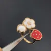 Modedesigner 4/fyra bladklöver V Gold Four Grass Ladybug Ring Female High Edition White Fritillaria Rose Five Flower Ornament