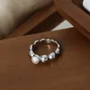 French niche ins cold wind elegant jewelry rice bead splicing design inlaid fresh water pearl titanium steel gold-plated ring