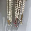 Desginer Viviane Westwood Empress Dowager Xis emalj Stereoskopisk Saturn Pearl -halsband för kvinnors ljus lyx och avancerad känsla krage kedja hög upplaga
