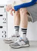 Sélection stricte de chaussettes, mode masculine, chaussettes de sport de rue, tendances européennes et américaines, couples à rayures, chaussettes de basket-ball pour hommes et femmes